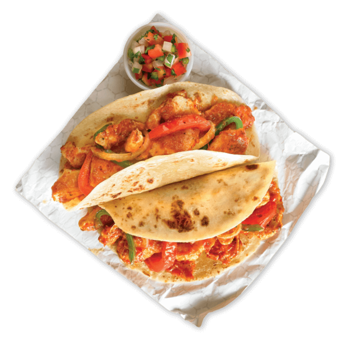 El Grito tacos on napkin with salsa