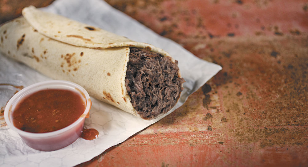 Barbacoa Taco on Napkin with Salsa